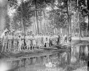 Troops of British cavalry ready for a bath at Vaux-sur-Somme, July 1916.© IWM (Q 4038)