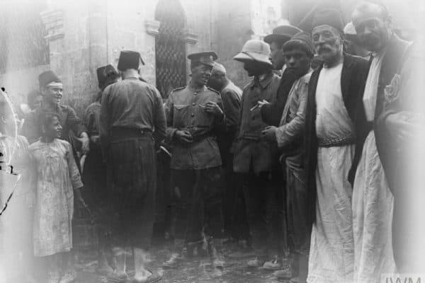 A scene in a bazaar in Aleppo including men of the 5th Cavalry Division, October 1918. © IWM (Q 12454)