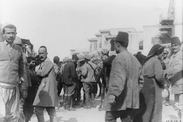 A street scene including men of the 5th Cavalry Division, in Aleppo, October 1918. © IWM (Q 12453)