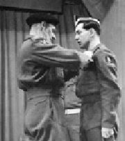 Maj LG Bellamy, MC, receiving his M.C. from Field Marshal Montgomery.